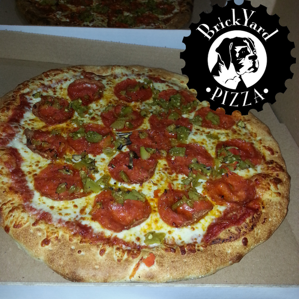8/21/2014 tarihinde Brickyard Pizzaziyaretçi tarafından Brickyard Pizza'de çekilen fotoğraf