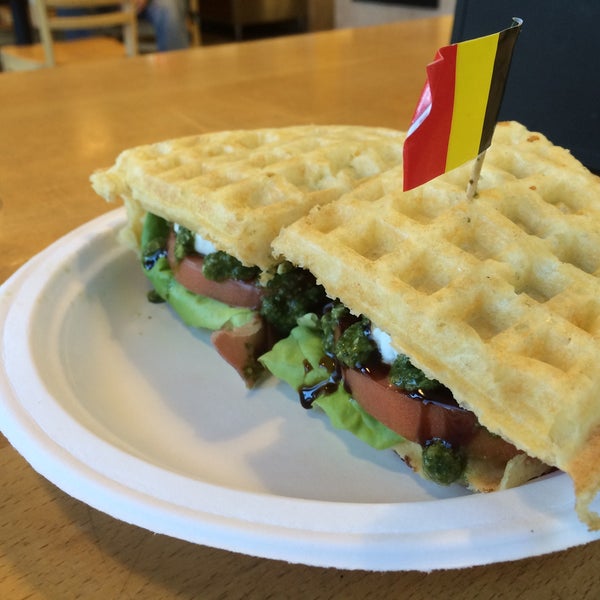 Photo taken at Bruges Waffles &amp; Frites by Joe M. on 9/11/2015