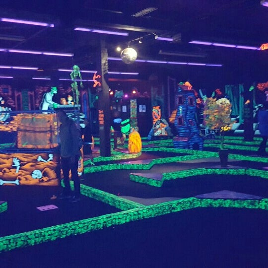 Photo taken at Monster Mini Golf by Stephanie P. on 1/9/2016