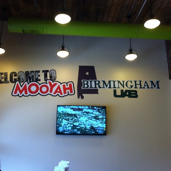 Photo taken at MOOYAH Burgers, Fries &amp; Shakes by Laura P. on 6/7/2014