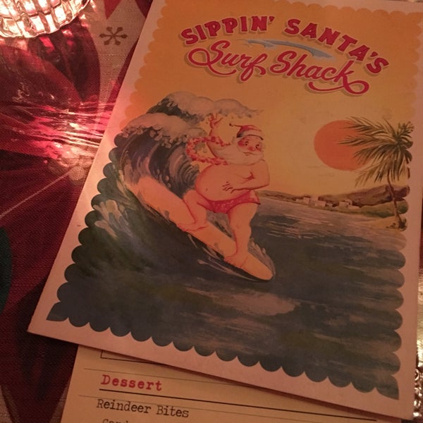 Photo taken at Sippin&#39; Santa&#39;s Surf Shack by Ashley G. on 12/21/2016