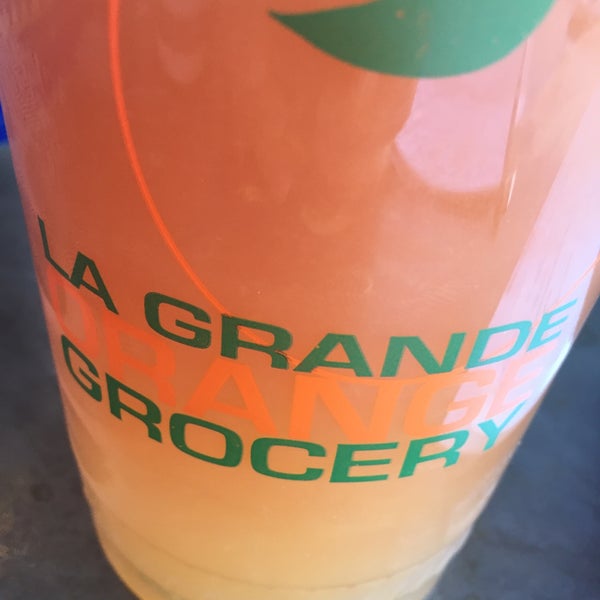 Photo taken at La Grande Orange Grocery &amp; Pizzeria by Ginger L. on 4/11/2016