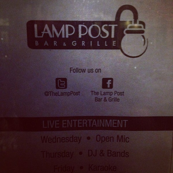 Photo taken at Lamp Post Bar &amp; Grille by Matthew L. on 4/4/2014