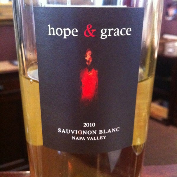 Photo taken at hope &amp; grace Wines by Killa K. on 4/5/2013