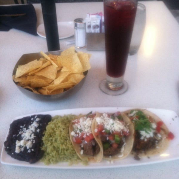 Photo taken at Cantina Laredo by Truly S. on 7/4/2013