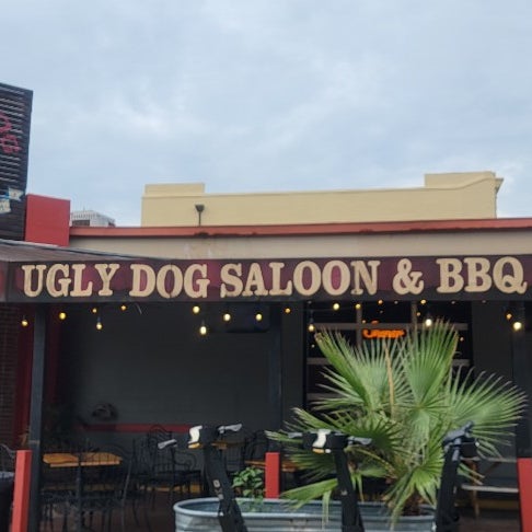 Photo taken at Ugly Dog Saloon and BBQ by Eric C. on 8/24/2022