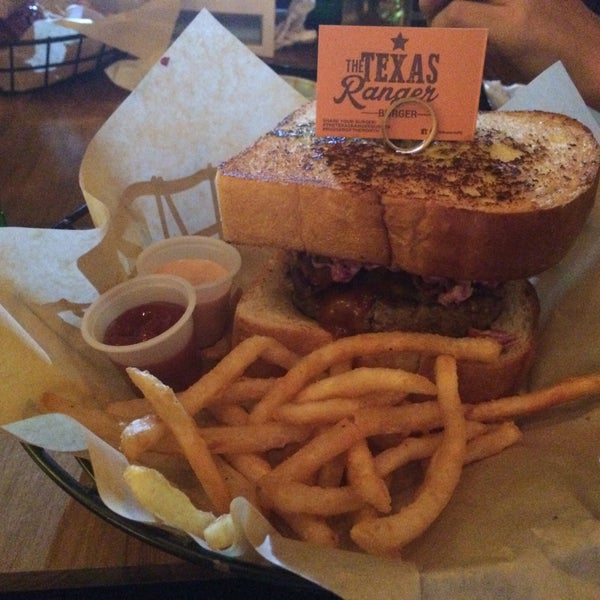 Photo taken at Mustard&#39;s Burger Shop &amp; Grill by Bryan U. on 12/28/2014