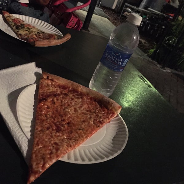 Photo taken at Downtown House Of Pizza by Erin W. on 7/7/2015