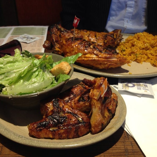 Photo taken at Nando&#39;s by Danny G. on 9/17/2013