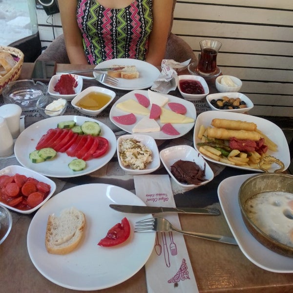 Photo taken at Biiz Cafe &amp; Bistro by Tuğçe Ö. on 6/14/2014