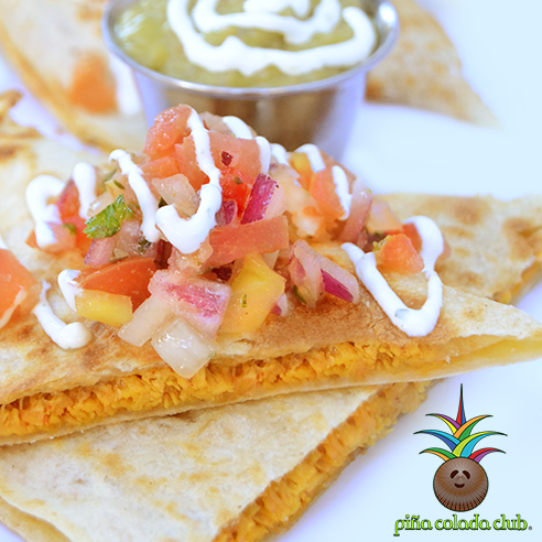 Our Latino Quesadillas! With pico de gallo, sour cream, guacamole, spicy housemade habanero sauce and your choice of savory chicken or beef @ Piña Colada Club #Quesadilla #Cheesy #sanjuan