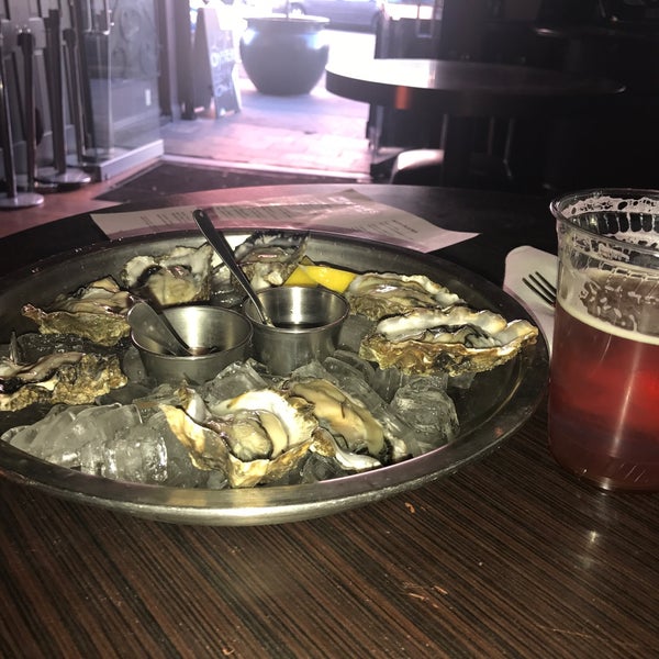 Photo taken at Mayes Oyster House by Brandon T. on 7/8/2017
