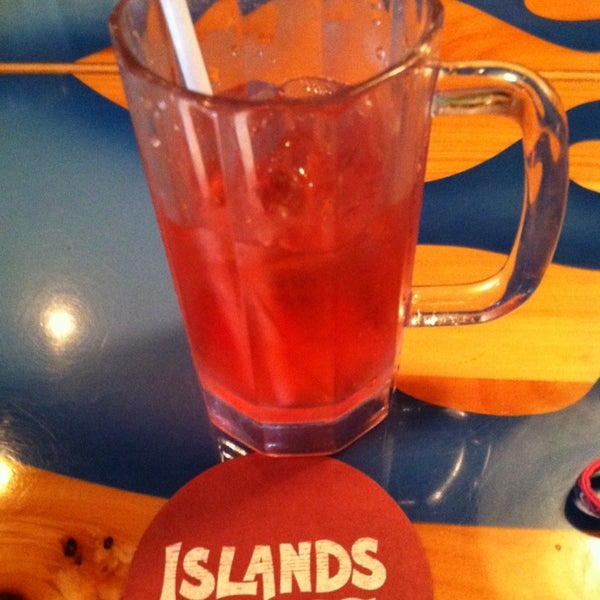 Photo taken at Islands Restaurant Long Beach Towne Center by Vicky V. on 5/17/2014