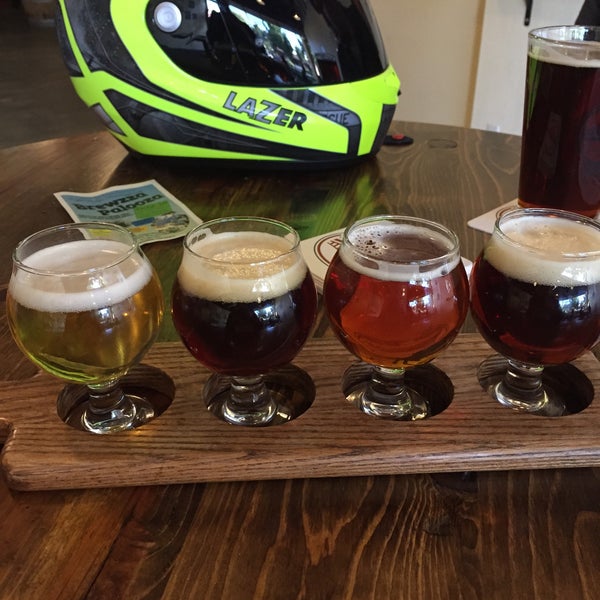 Photo taken at Eight Bridges Brewing by Vicky W. on 7/9/2015