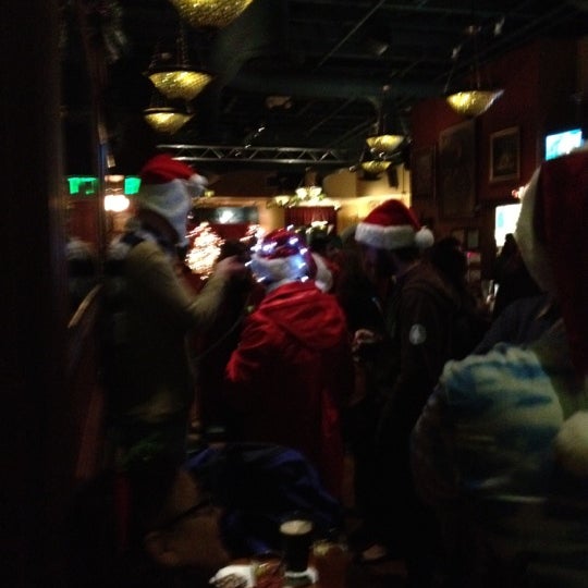 Photo taken at Rosie McCann&#39;s Irish Pub &amp; Restaurant by Vicky W. on 12/16/2012