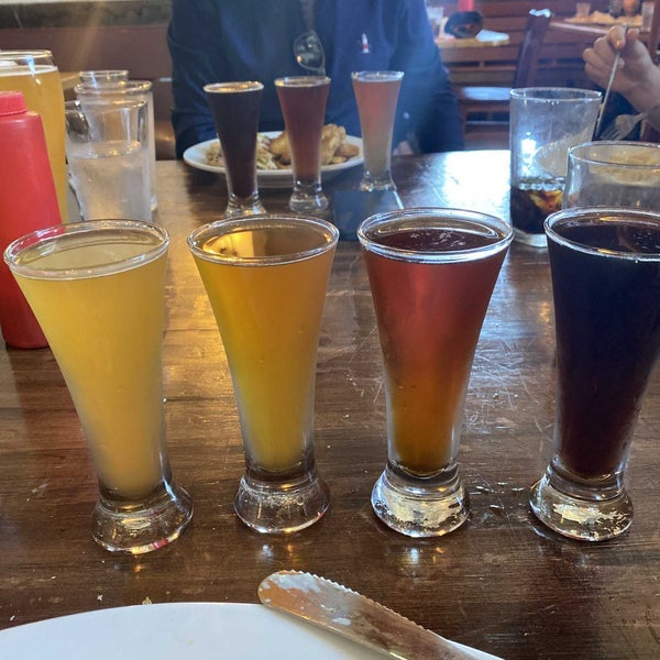 Photo taken at Outer Banks Brewing Station by Matthew K. on 4/15/2022