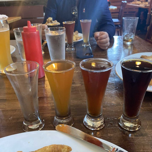 Photo taken at Outer Banks Brewing Station by Matthew K. on 4/15/2022