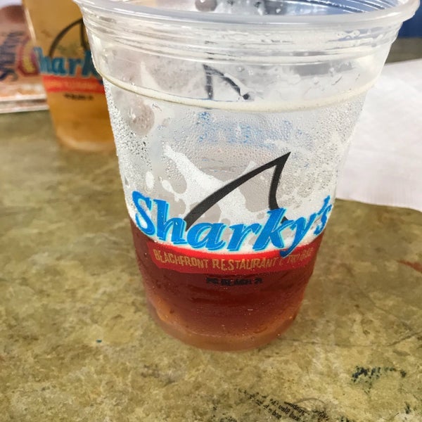 Photo taken at Sharky&#39;s Beachfront Restaurant by Robert H. on 7/6/2019
