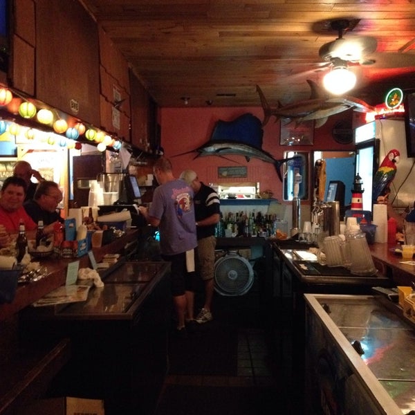 Photo taken at Bimini&#39;s Oyster Bar and Seafood Cafe by David A. on 4/23/2014