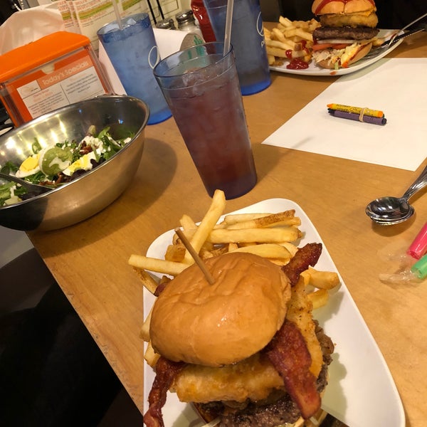 Photo taken at Crave Real Burgers by moth on 1/11/2018