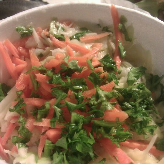 The coleslaw is surprisingly light, tangy, and tasty.
