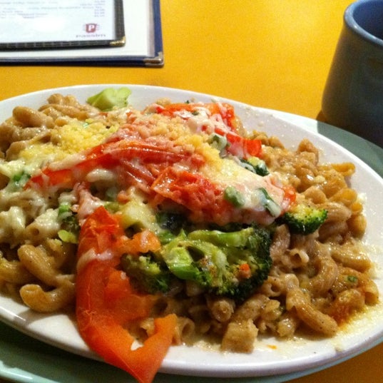 Photo taken at Veggie Planet by Christina Y. on 1/1/2012