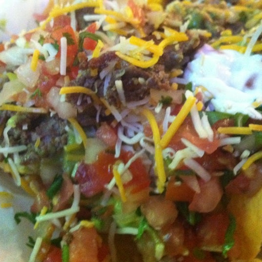 Photo taken at Taco Shop Mexican Grill by Angela D. on 3/15/2012