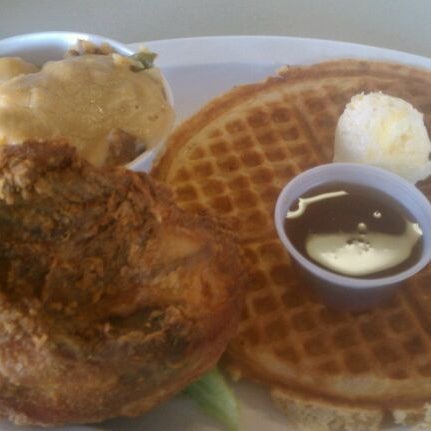 Photo taken at Home of Chicken and Waffles by Hugo V. on 1/26/2012