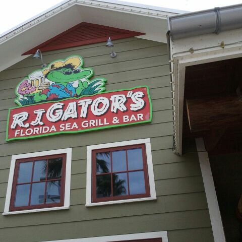 Photo taken at RJ Gator&#39;s Florida Sea Grill &amp; Bar by Ann C. on 12/30/2011