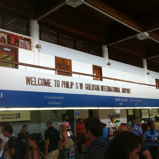 Photo taken at Philip S.W. Goldson International Airport (BZE) by Brandon B. on 7/14/2011