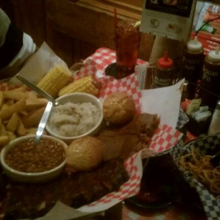Photo taken at Famous Dave&#39;s by Nicole H. on 2/28/2012