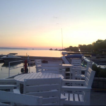 Photo taken at Dockers Waterfront Restaurant &amp; Bar by Chris T. on 7/12/2012