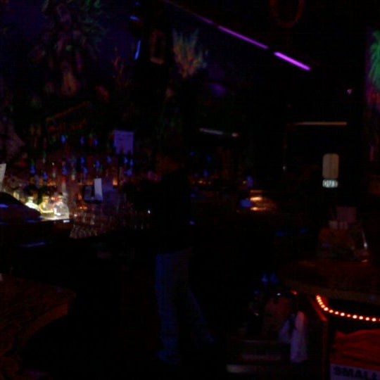 Photo taken at Gilligan&#39;s Tropical Bar &amp; Grill by Nathan F. on 1/16/2012