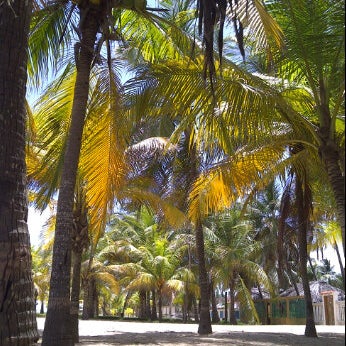 Photo taken at Playa de Boca de Uchire by Lucia O. on 9/17/2011
