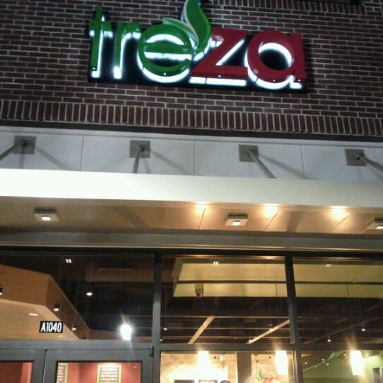 Photo taken at Treza Fine Salad &amp; Wood-Fired Pizza Co by Evan C. on 11/17/2011