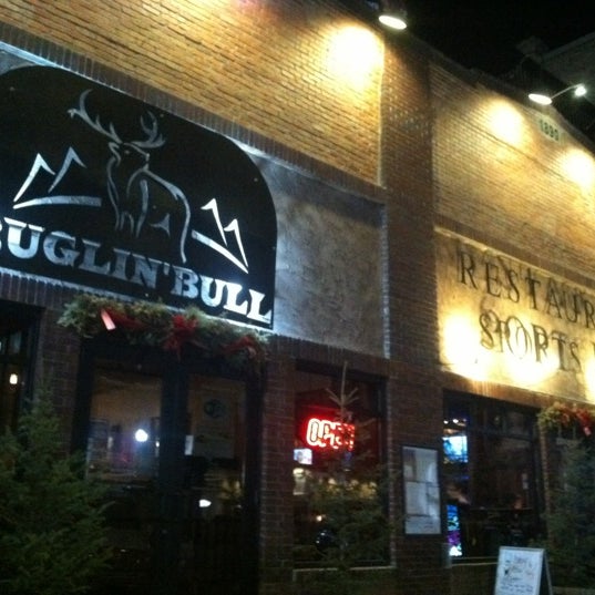 Photo taken at Buglin&#39; Bull Restaurant and Sports Bar by David H. on 2/4/2012