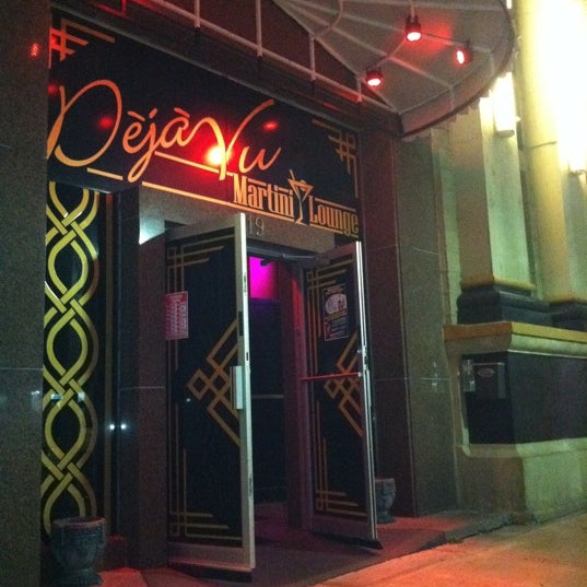 Photo taken at Deja Vu Martini Lounge by Eric H. on 9/17/2011