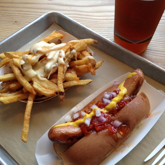 Photo taken at Bark Hot Dogs by Ryan H. on 8/26/2012