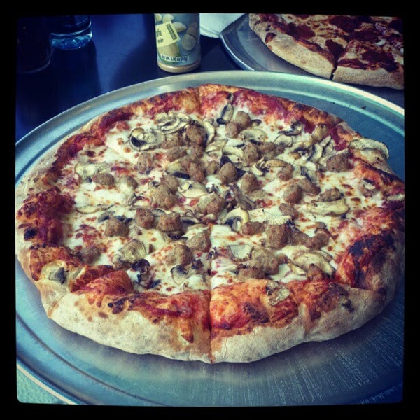 Photo taken at Deli News Pizza by D on 4/5/2012