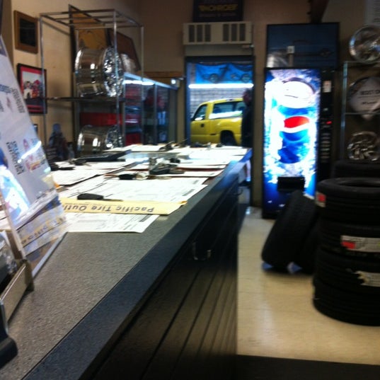 Photo taken at Pacific Tire Outlet by Lisa D. on 5/26/2012