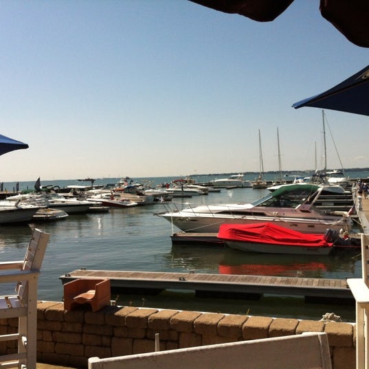 Photo taken at Dockers Waterfront Restaurant &amp; Bar by Laura M. on 7/29/2012