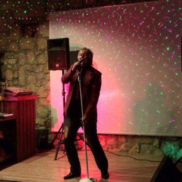 Foto diambil di Lithos Bar &amp; Grill oleh Zinaida G. pada 4/18/2014