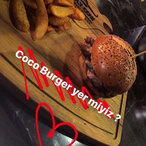 Photo taken at Holy Cow Gourmet Burgers &amp; Steakhouse by Ege Pınar S. on 4/2/2017