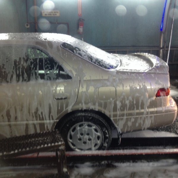 Photo taken at Studio City Hand Car Wash by John H. on 1/14/2014