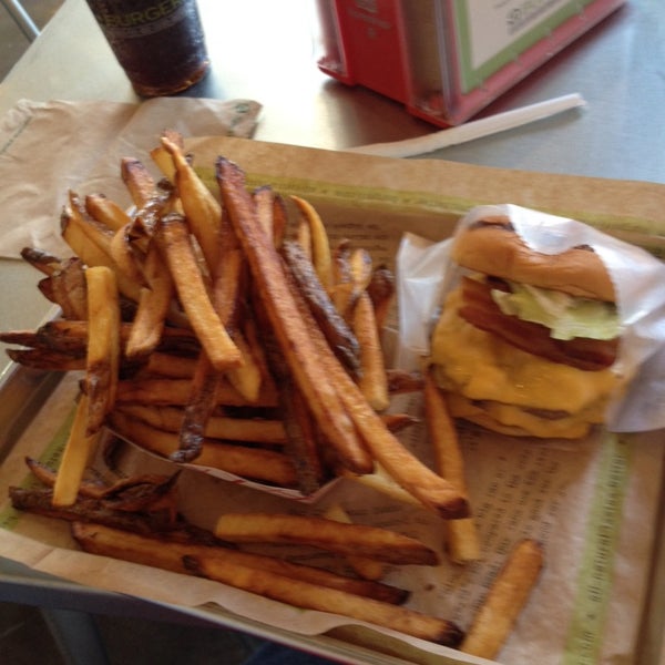 Photo taken at BurgerFi by Danny G. on 9/3/2014