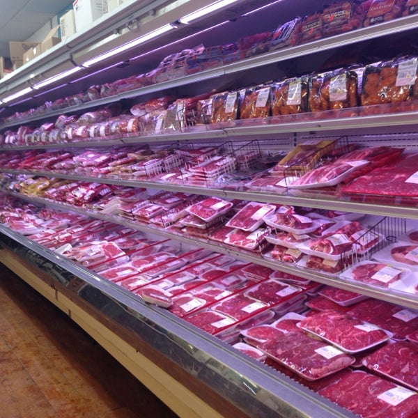 Photo taken at McKinnon&#39;s Meat Market by Onur Ö. on 2/7/2014