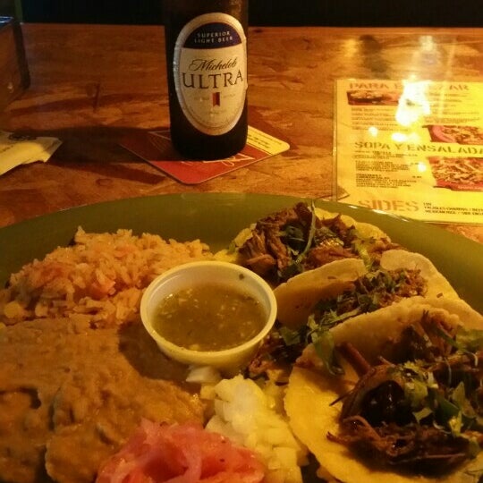 Photo taken at Ojos Locos Sports Cantina by Anna H. on 6/22/2015