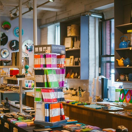 Pop-colored home goods like tea kettles and media racks are the perfect counterpoint to the shop’s in-house line of futuristic-looking, sustainable stainless steel and vegan leather clutches.