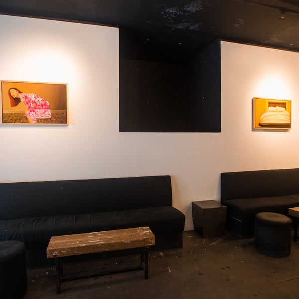 Downstairs is a modern art gallery, and upstairs is a rocking bar fit with a photobooth.