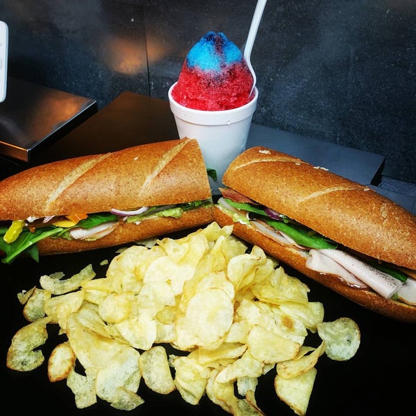 Photo taken at Rockaway Beach ATX Shaved Ice &amp; Subs by Corey R. on 11/30/2015